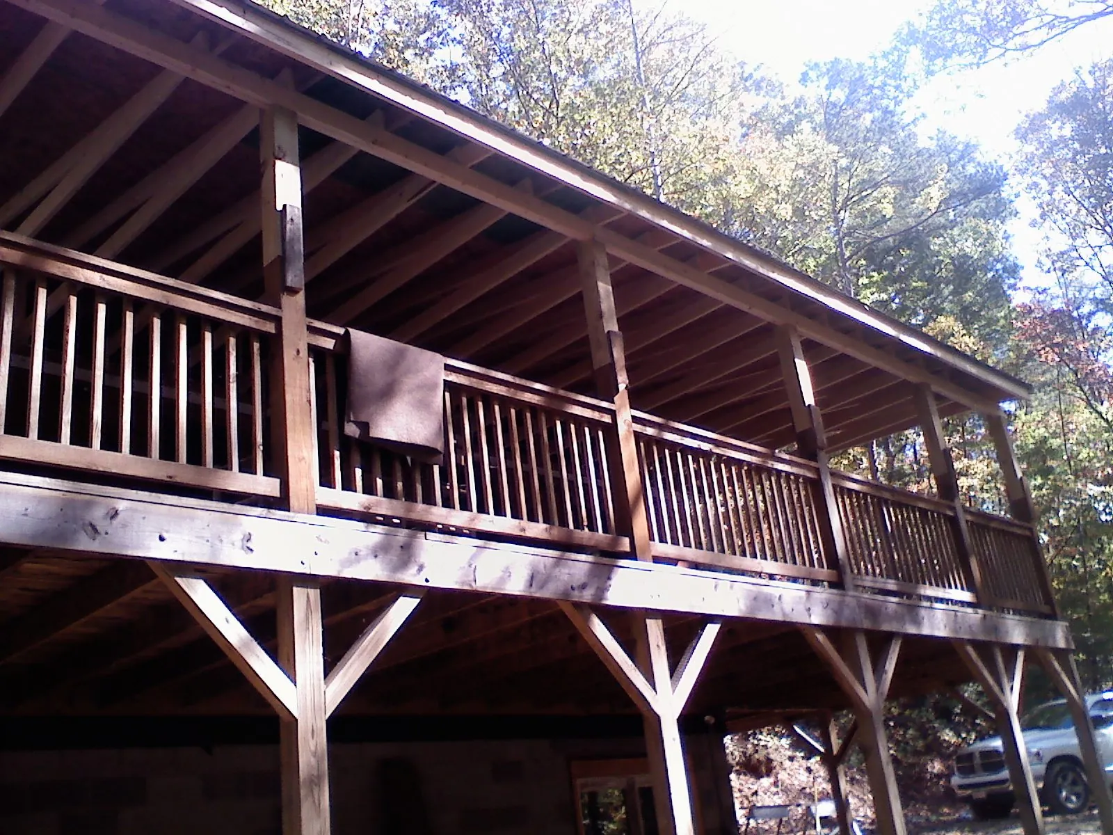 Timber framing under a new elevated porch and deck — Roof Leak Repair in Follansbee by Roofing Brothers